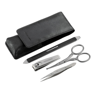 Essential Grooming Kit on white background with tools laying flat. Kit features the Stainless Steel Fingernail Clipper, Facial Hair Scissors, Dual Sided Pushy and Nail Cleaner and a Tweezerette tweezer with black storage case.
