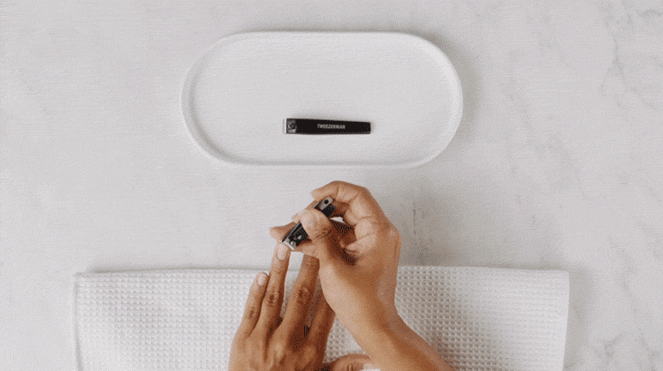 model with fingernail clipper